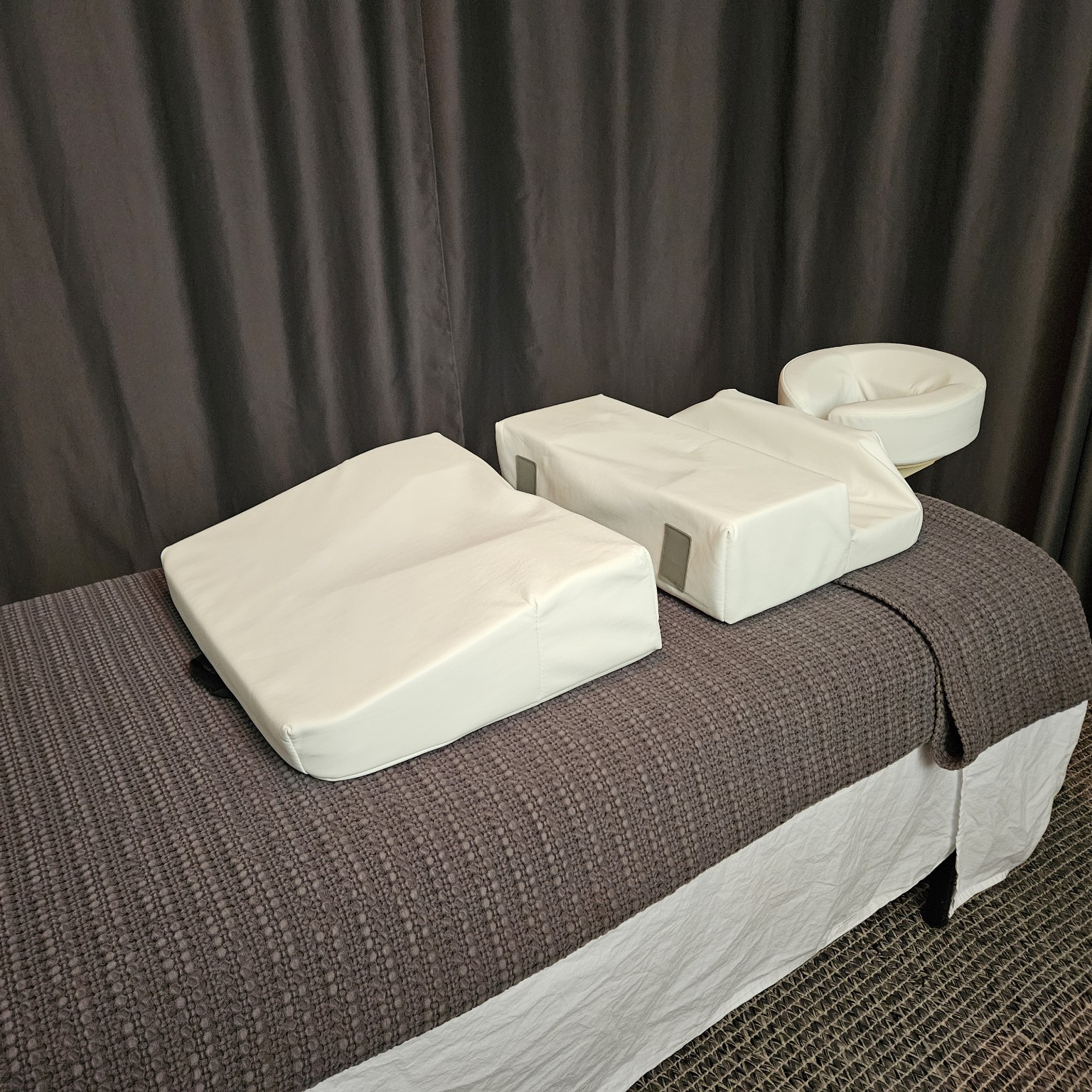 Pregnancy cushion setup for supported face-down massage at Soft Tissue Engineering in Pendleton, Oregon
